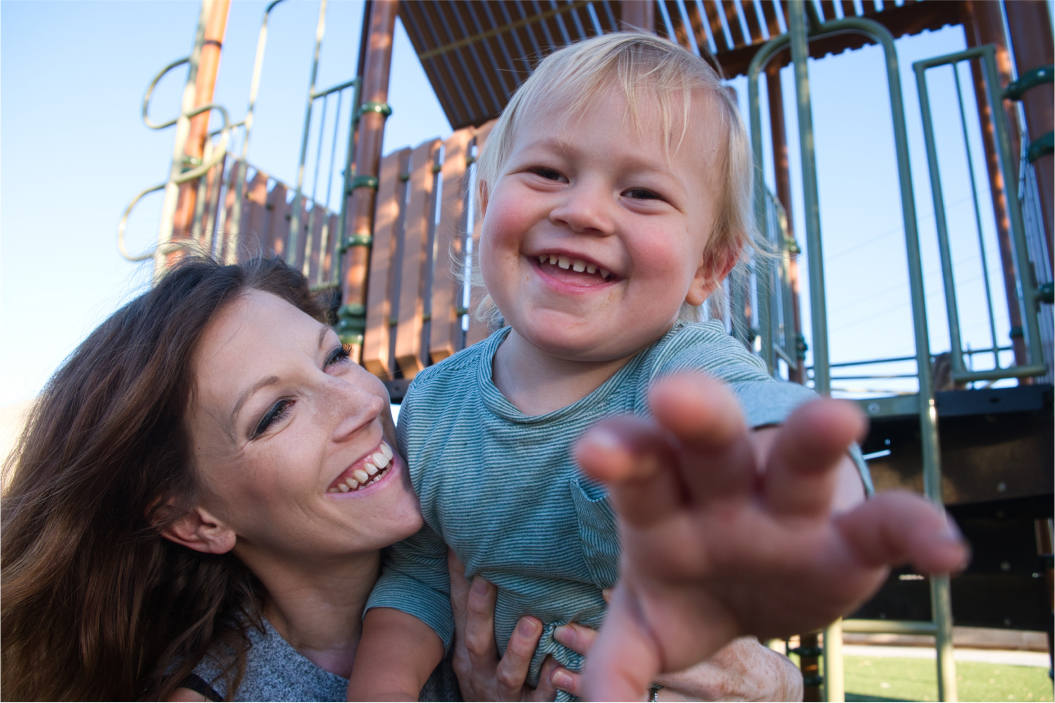 Woman with baby smiling