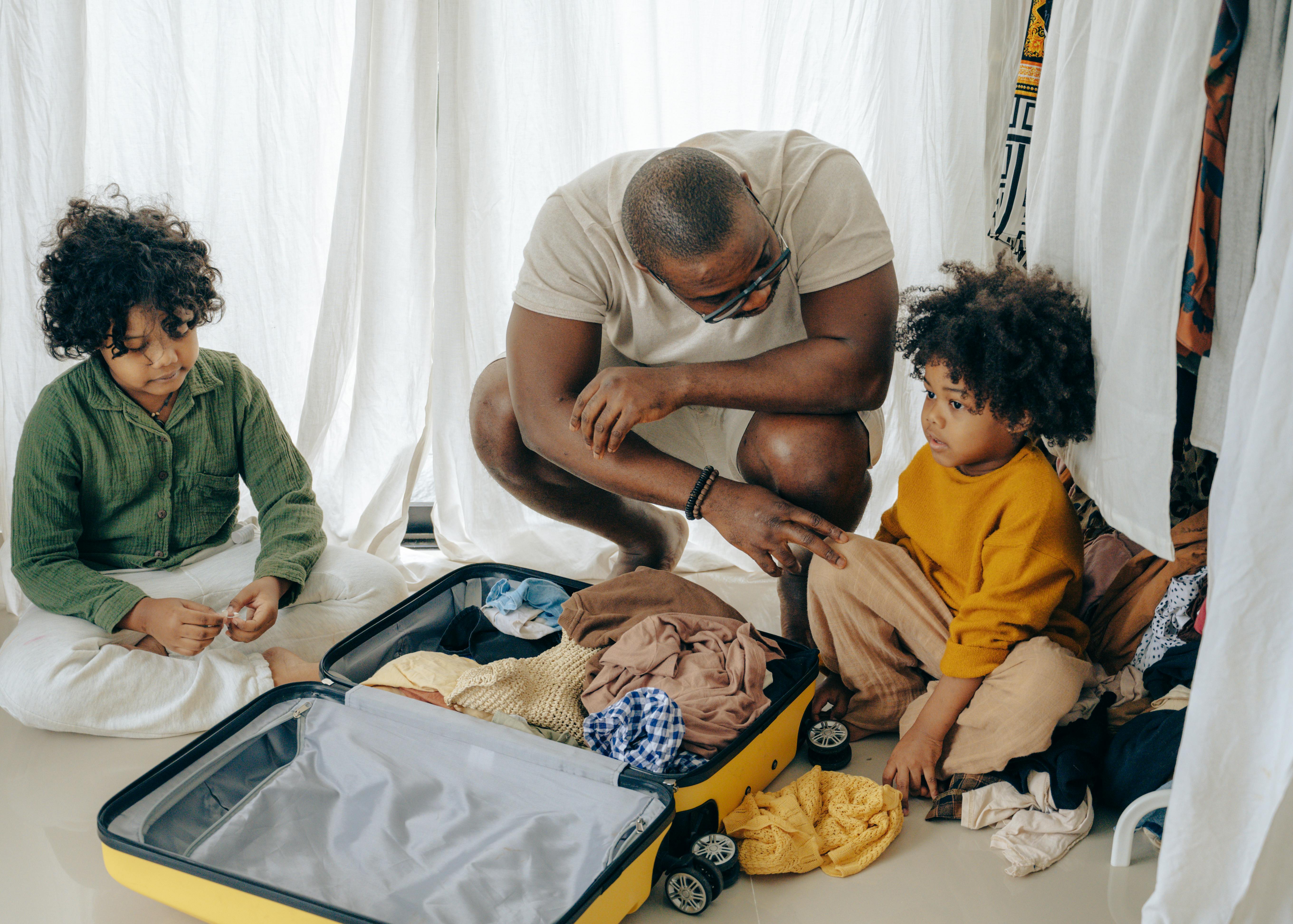 Father speaking with his children