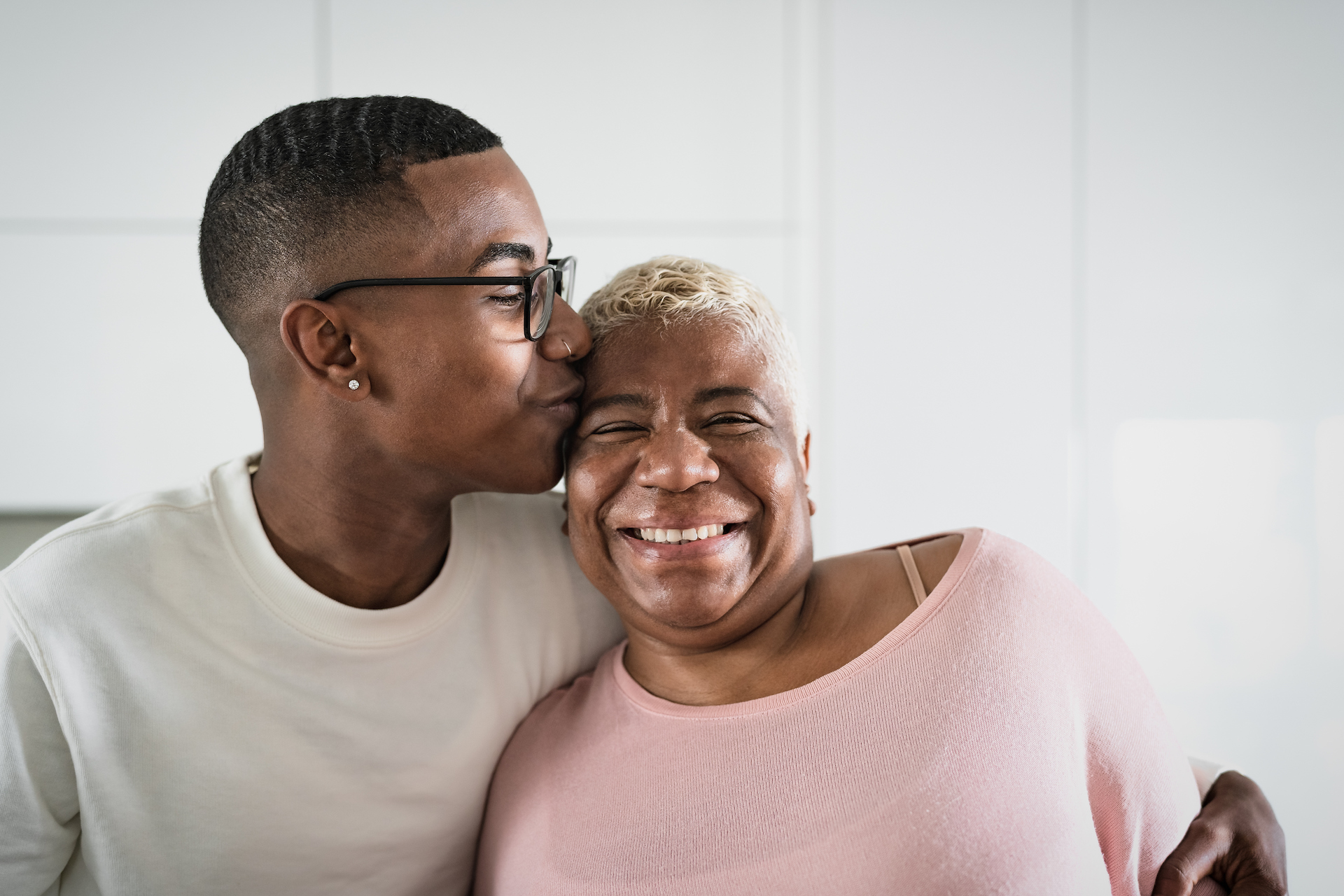 Happy Hispanic mother and son portrait